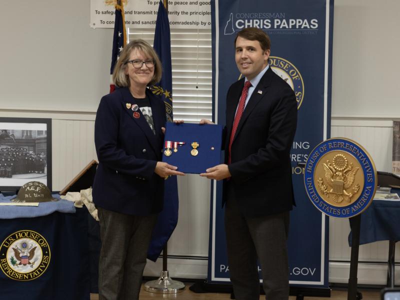 Congressman Pappas (right) presenting a WWI Victory Medal and a WWI Victory Button Bronze for Grace Derby Banker to her granddaughter, Carolyn Timbie (left)