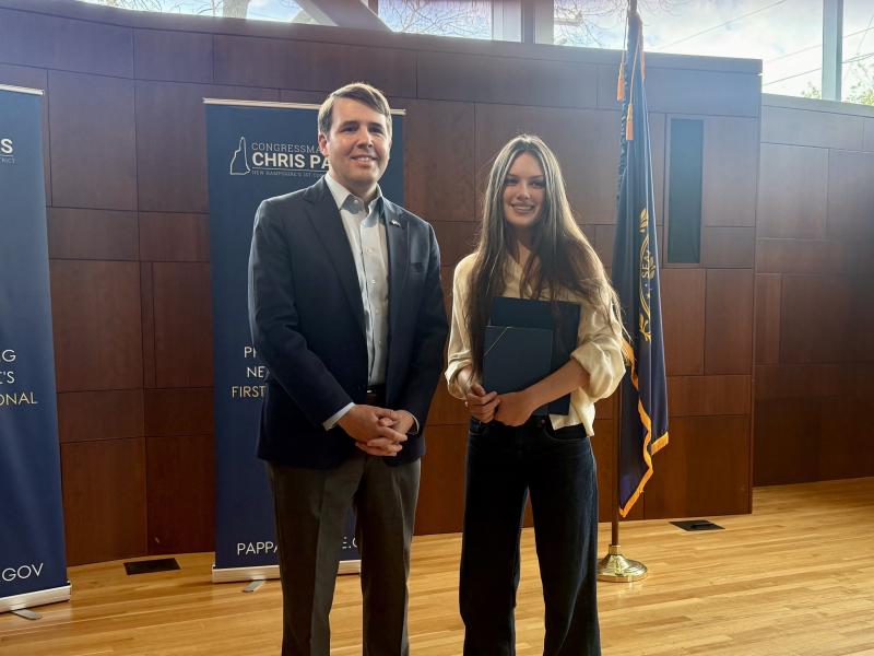 Congressman Pappas with first-place winner Julia Thomas of Raymond High School