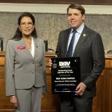  Congressman Chris Pappas (R) receives the DAV Outstanding House Legislator of the Year award from DAV National Commander Nancy Espinosa (L)