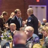 Congressman Pappas (L) shakes Chief Garone’s (R) hand at a June 2022 event honoring Garone’s 50 years of service to Derry