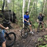 Rep. Pappas biking through a forest